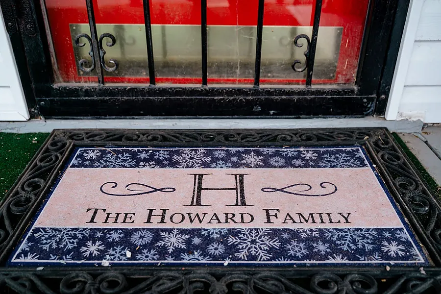 Doormat with The Howard Family written on it