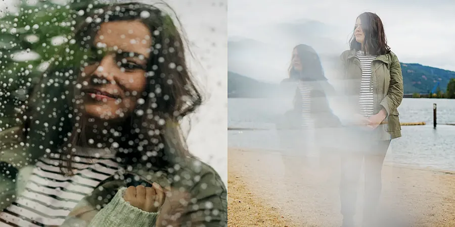 Image of a woman at beach smiling