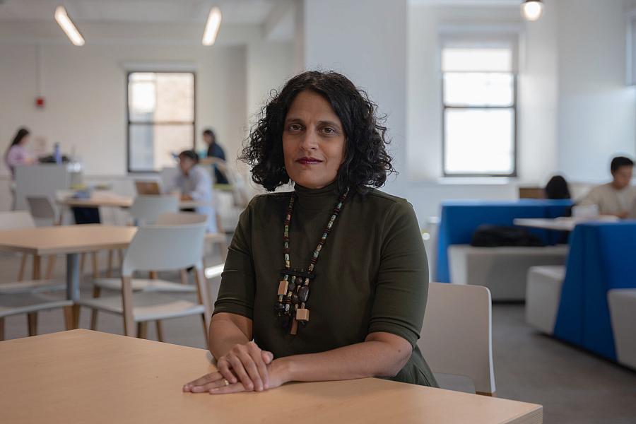 Image of a woman sitting for a portrait in the building