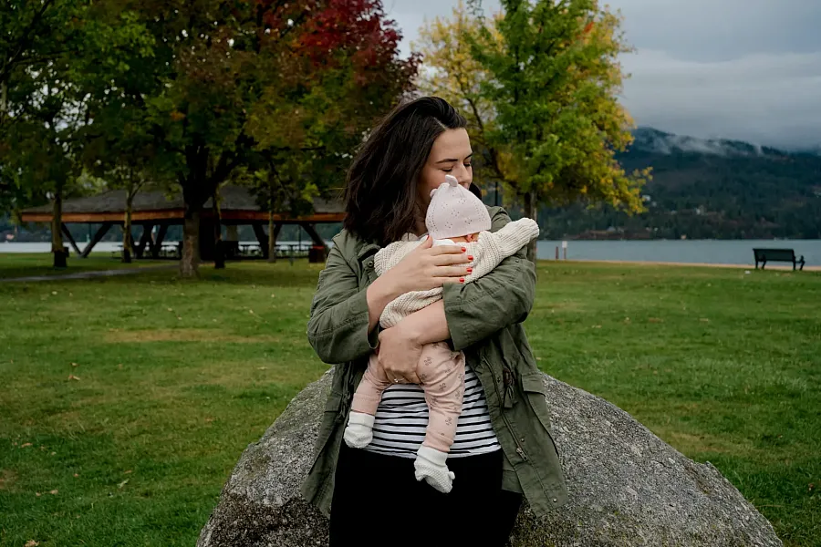 Image of a mother holding her baby