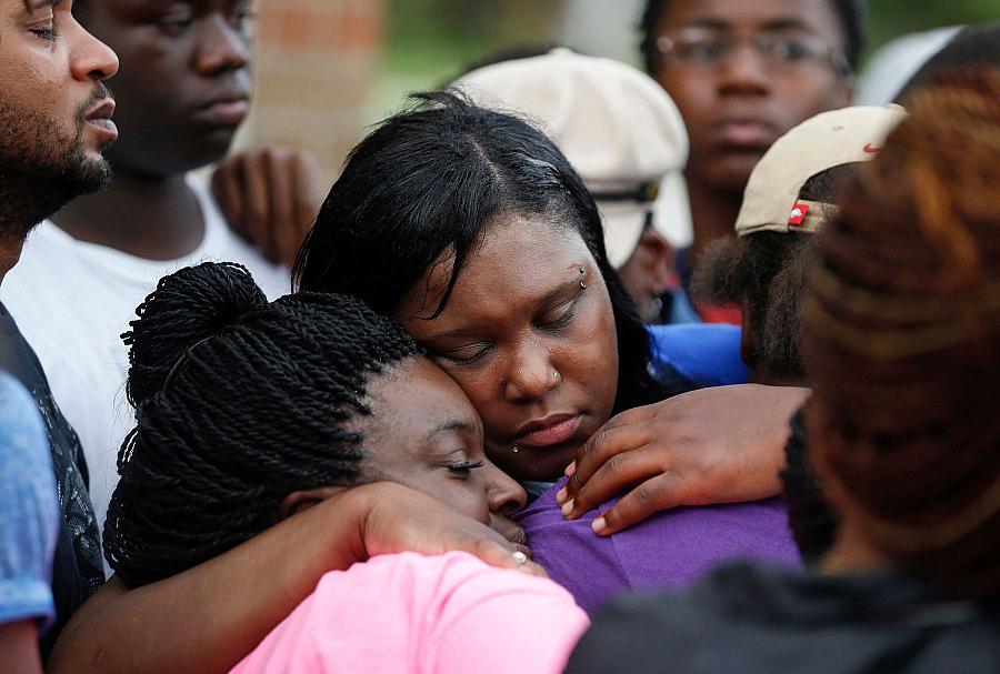 Image of people hugging each other