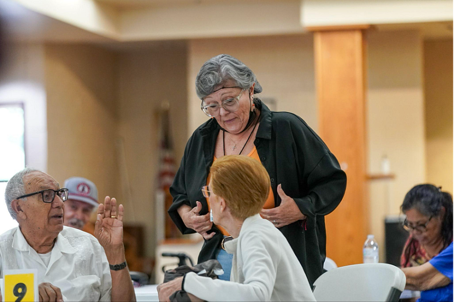 People talking at a table