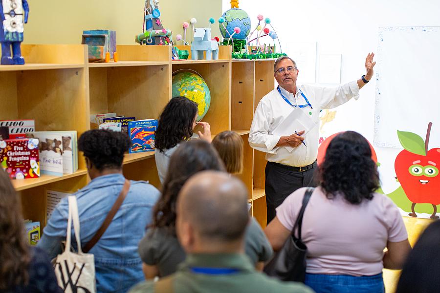 Ronald E. Brown, president and CEO of All For Kids, speaks to reporters at Magnolia Place.