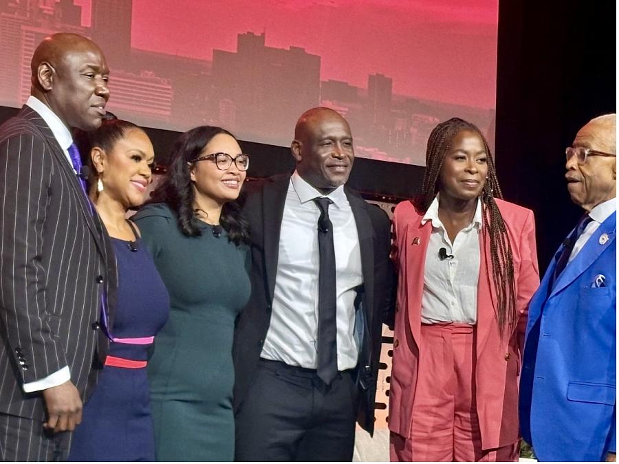 From left, attorney Ben Crump, moderator Tiffany Cross, Christine Wells-Wonsley, Elmore Wonsley, NABJ president Errin Haines, and the Rev. Al Sharpton onstage at the National Association of Black Journalists convention in Atlanta on Aug. 13.