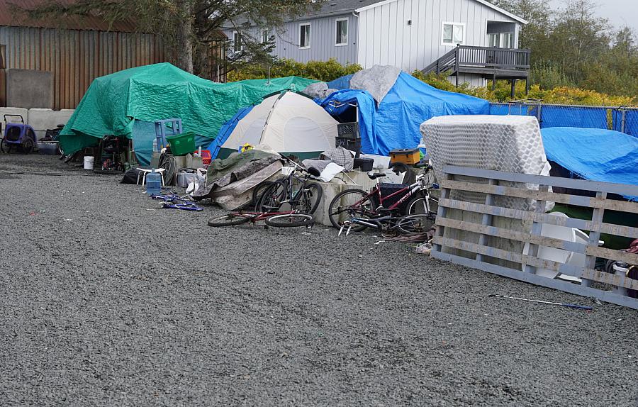 Tents and bikes on a concrete road