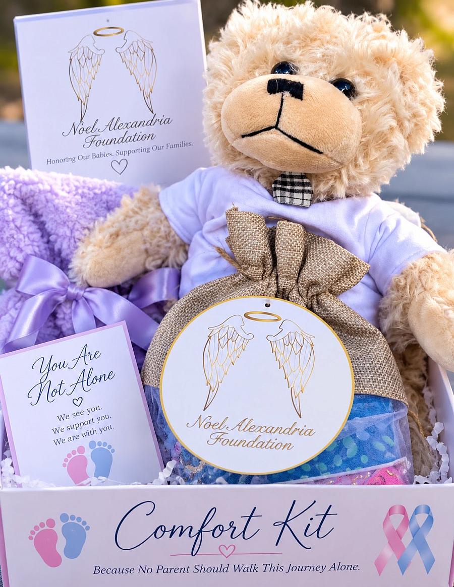A teddy bear and purple blanket are seen in a basket as an example of a 'comfort kit' given to hospitals for families experiencing the loss of an infant.
