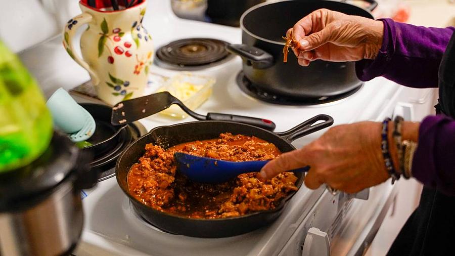 Stovetop with a dish being prepared