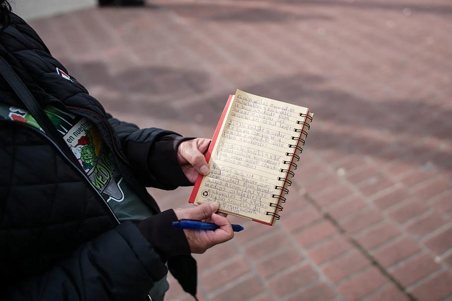 person holding a notebook