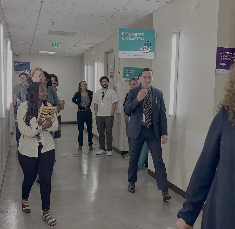 Journalists tour a medical facility in LA.