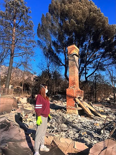 Woman staring at fire damage