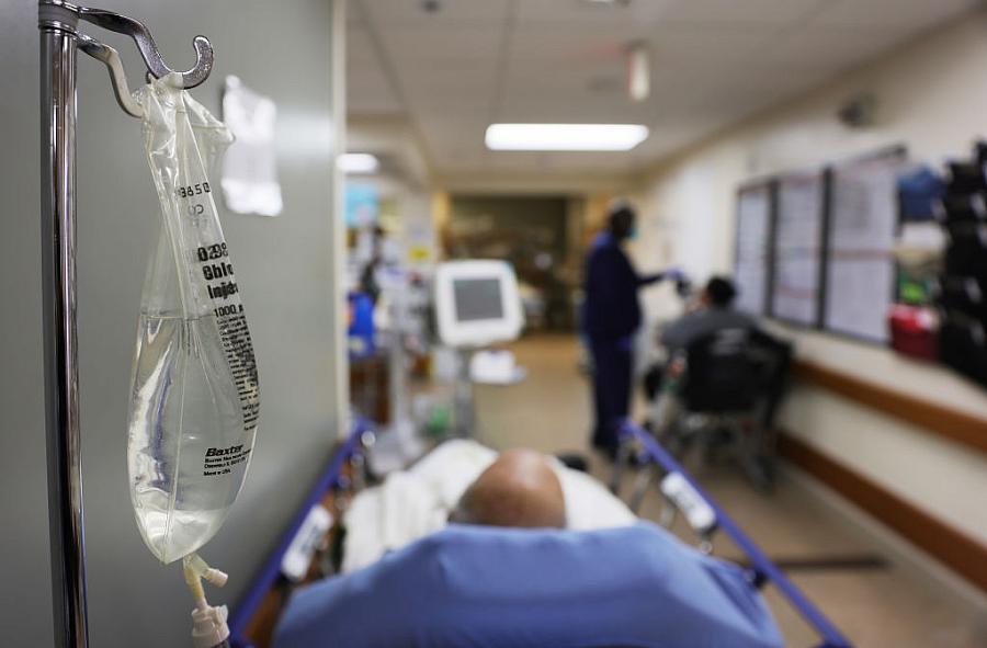 IV bag with hospital background