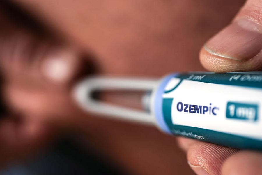 Ozempic shown being administered.