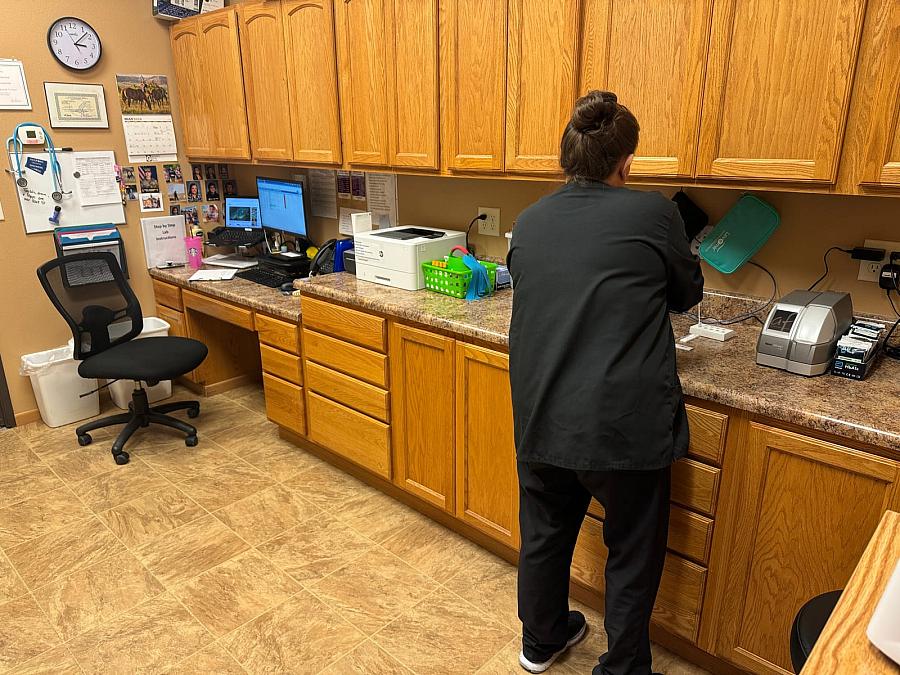 Person standing by a counter