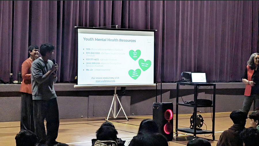 A Desi youth leads a conversation on mental health in a local high school auditorium 