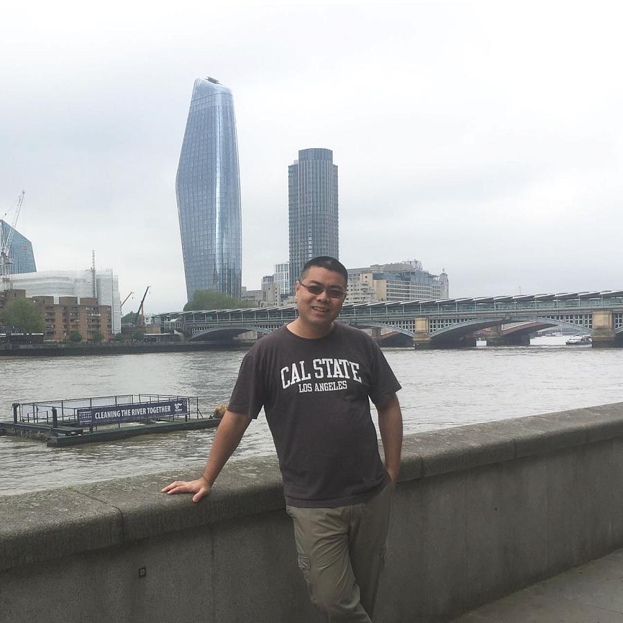 Person standing by a water body