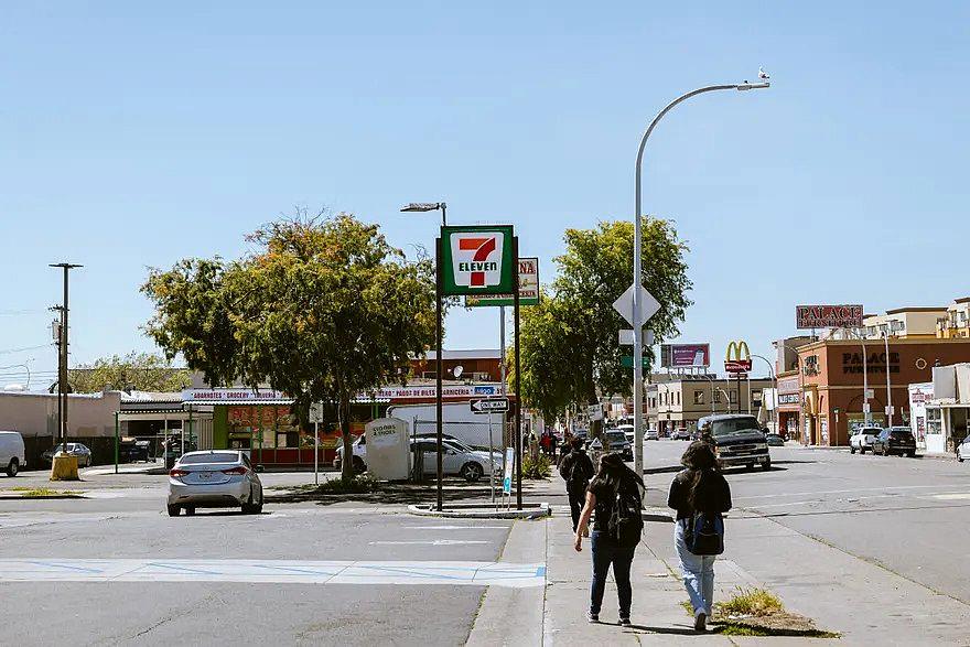 Students walking on the street.