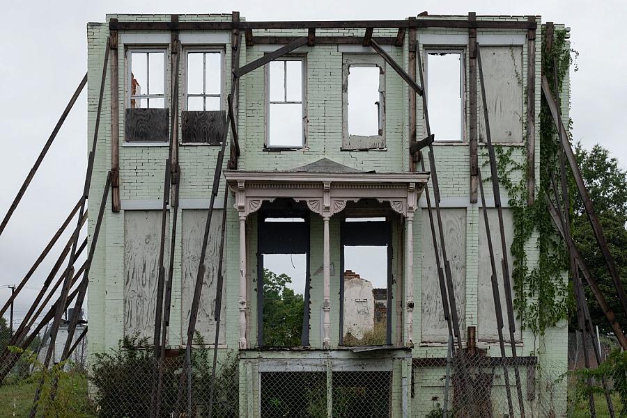 Building held in place with steel and wood beams