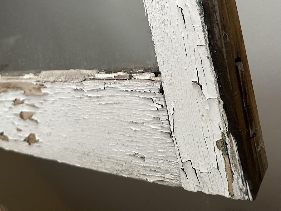 Peeling paint on window