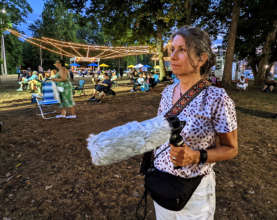 A woman with a mic