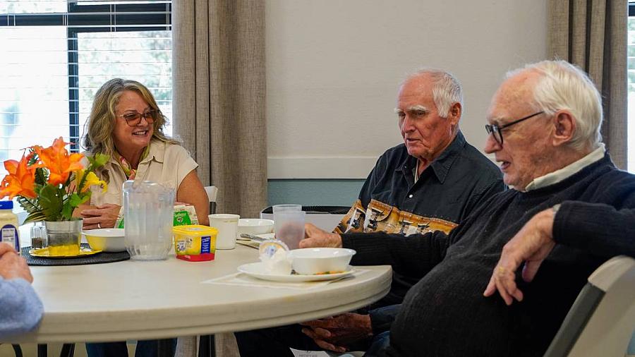 3 people at a table