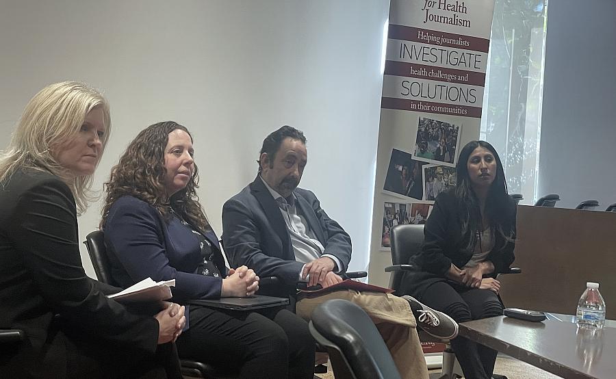 Panelists sit before a table at the 2024 California Health Equity Fellowship in Los Angeles on March 13.