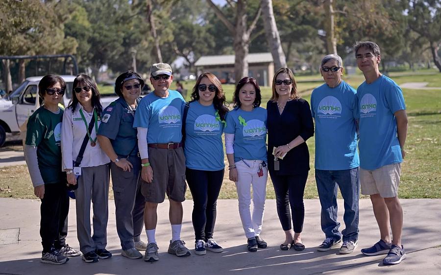 9 people standing together