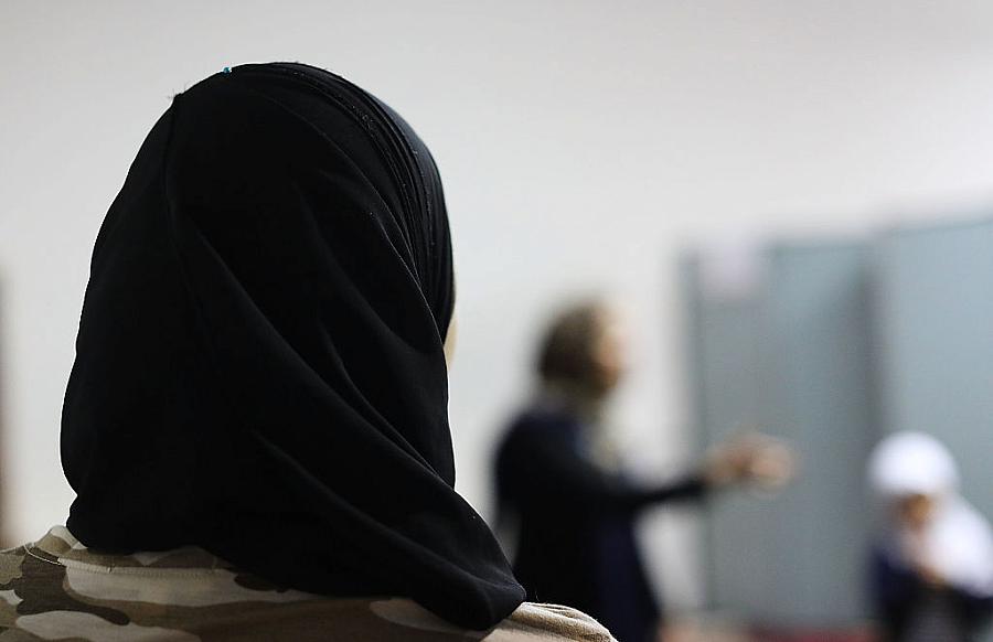 Back image of a person wearing burkha