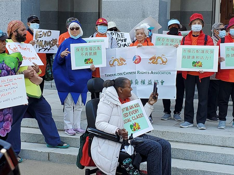 Group of people with banners