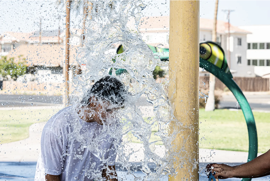 Person with water splashing around them