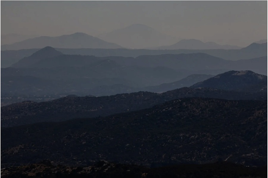 mountains visible in fog