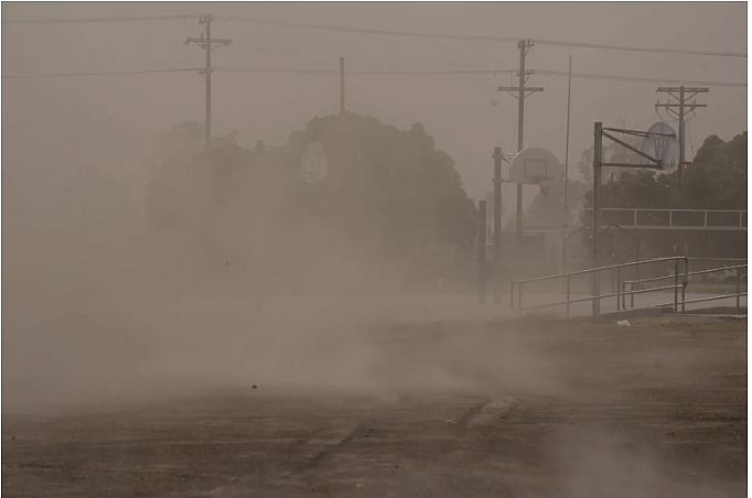 Dust blowing through a playground