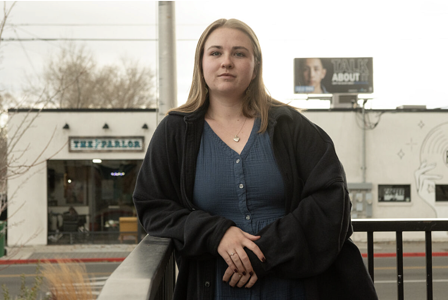 Person leaning on a railing