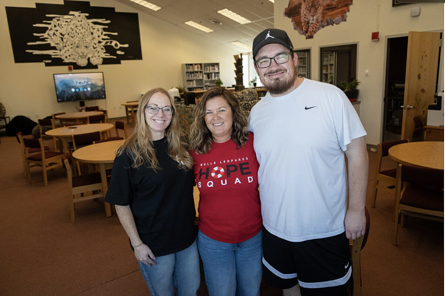 3 people standing together