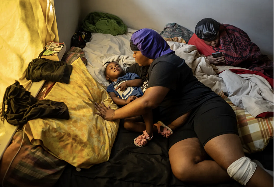 Person laying with a child