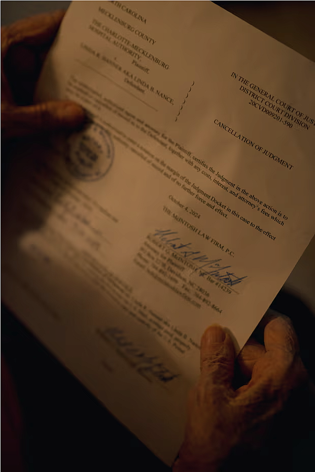 Hands holding a document