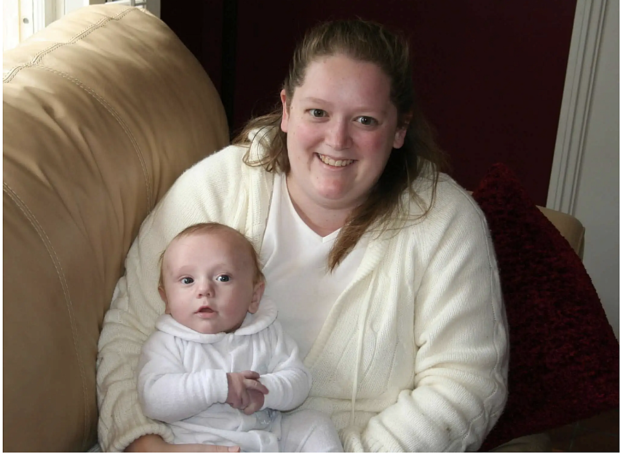 Person holding a baby