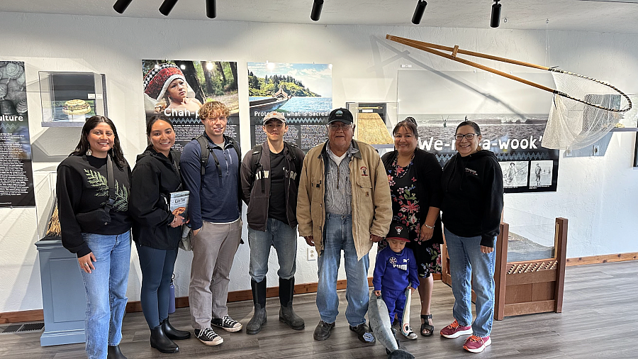 A group of native medical students smile at the camera during orientation week