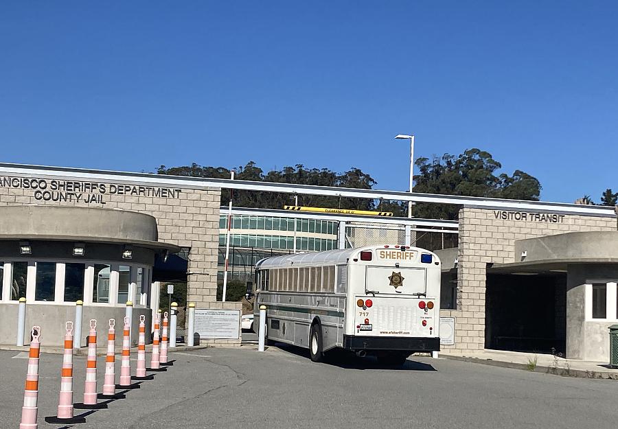 A bus near a building entrance