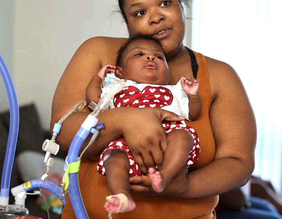 Person holding a baby