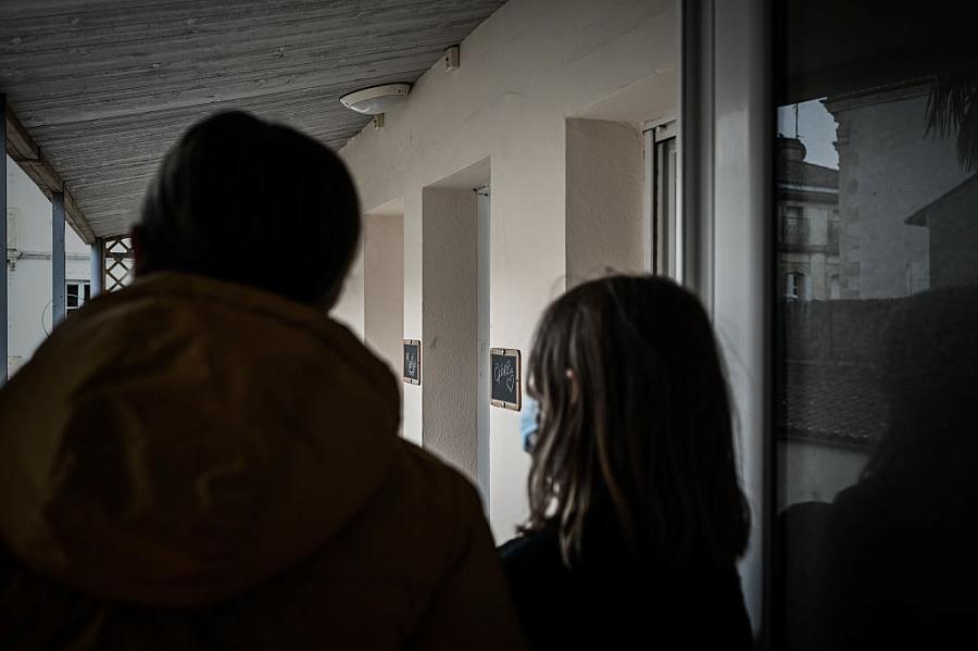 closeup image of a parent and child in a building