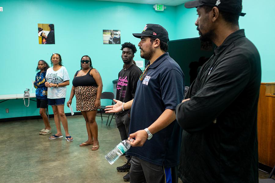 Chuco's Justice Center staff talk to journalists.