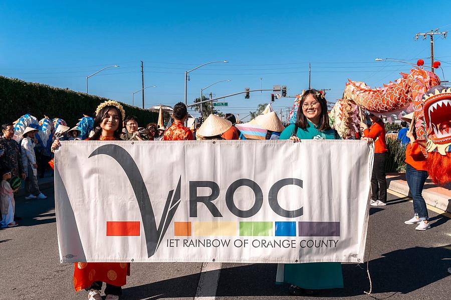 People holding up a banner
