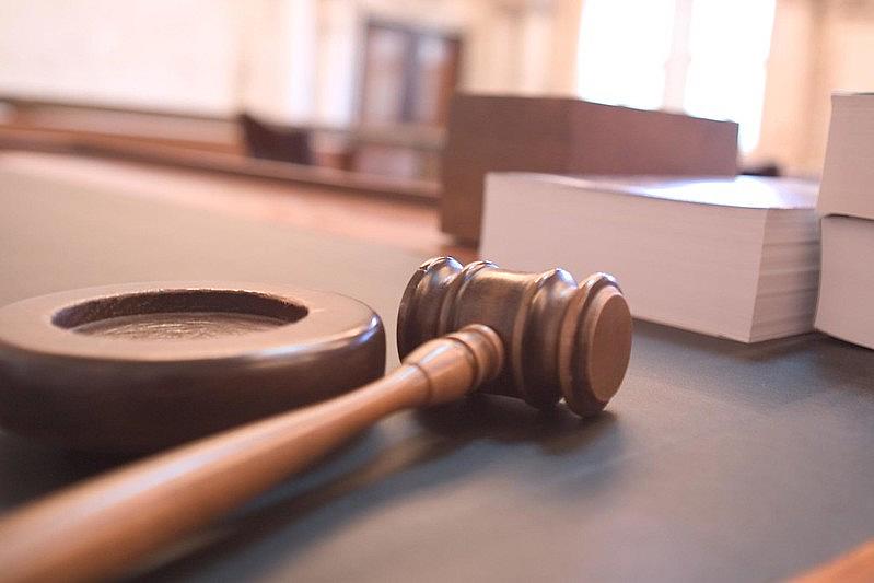 Image of a gavel in a courtroom