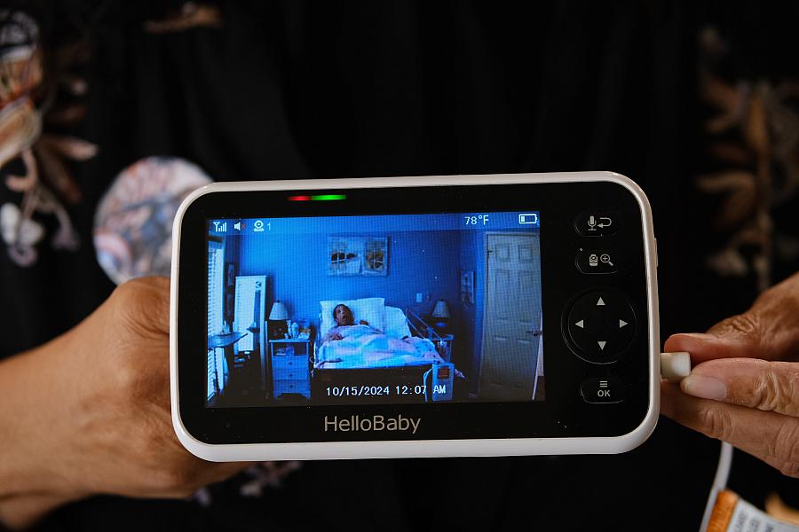 Person holding a monitor