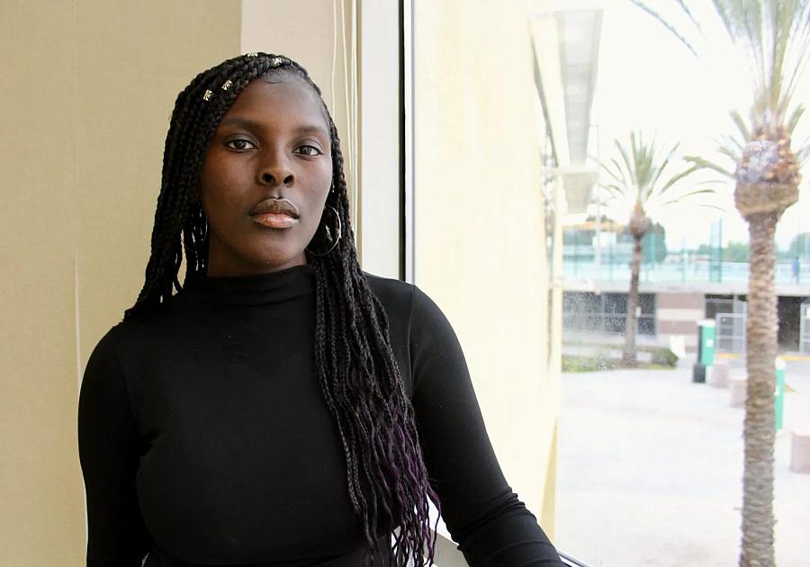 Chrishana Bunting,16, poses for a photo inside the Lincoln High School library in San Diego on Feb. 13, 2023. Throughout her pre-teen and teen years, she experienced adultification bias and anti-Blackness. (Anissa Durham/Word In Black)