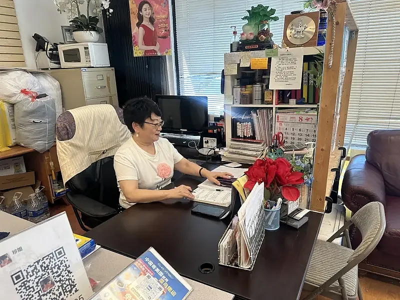 Person sitting at their desk