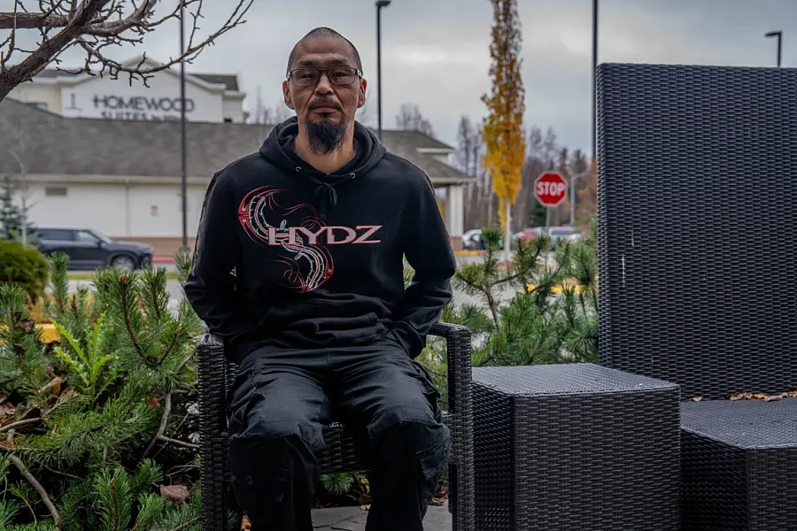 A person sitting on a chair