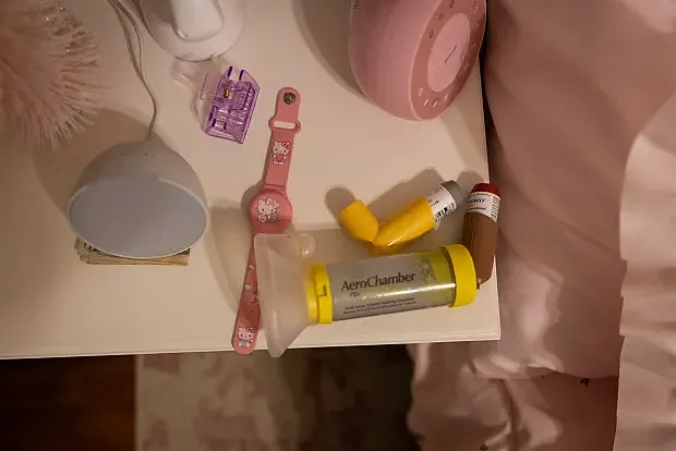 Inhaler and AeroChamber on nightstand
