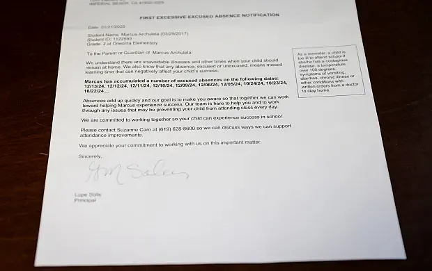 Absence notification letter on table