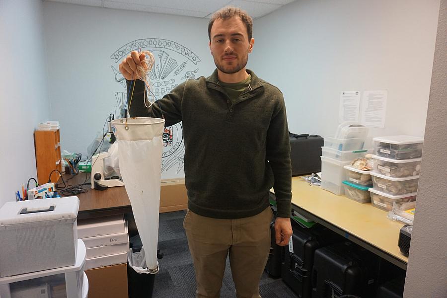 A person holding an item